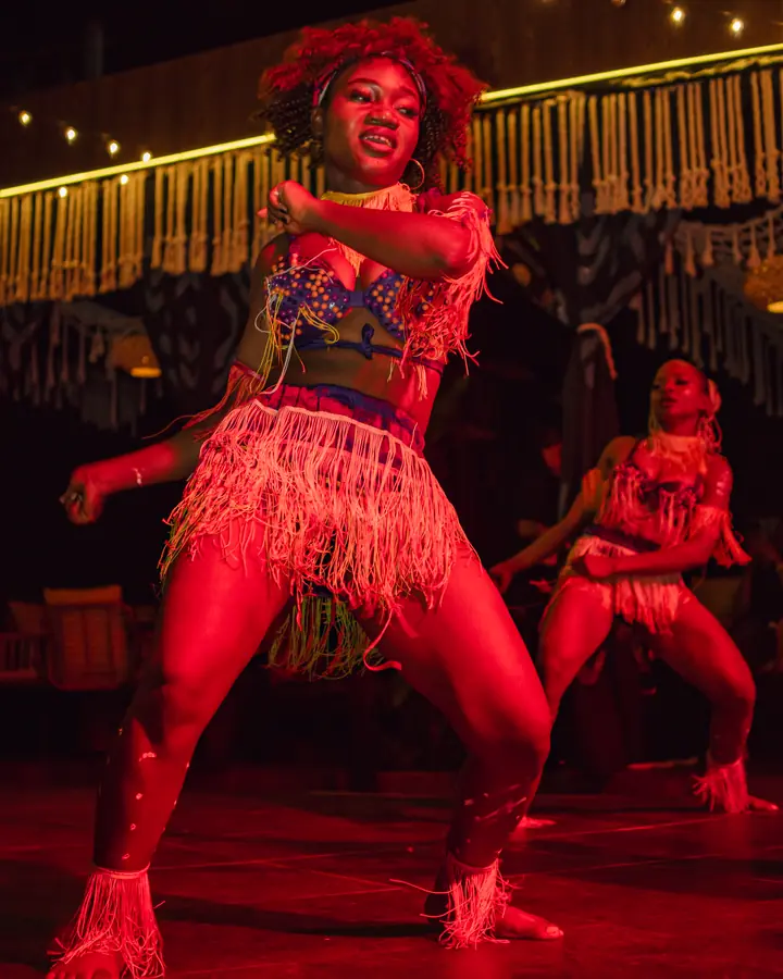 A dancer performing on the stage at Brisa